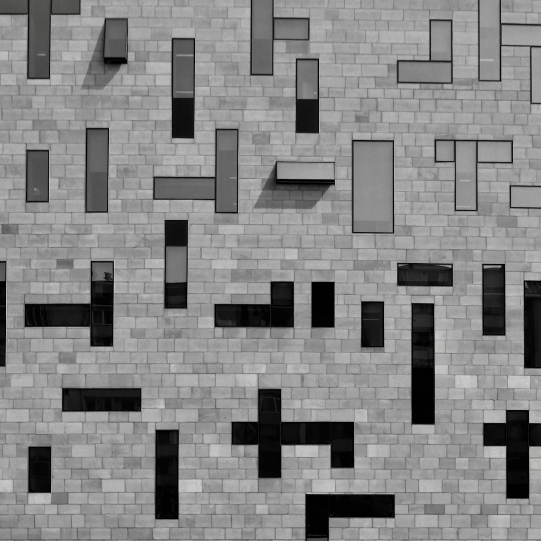 A modern building facade with unique windows.